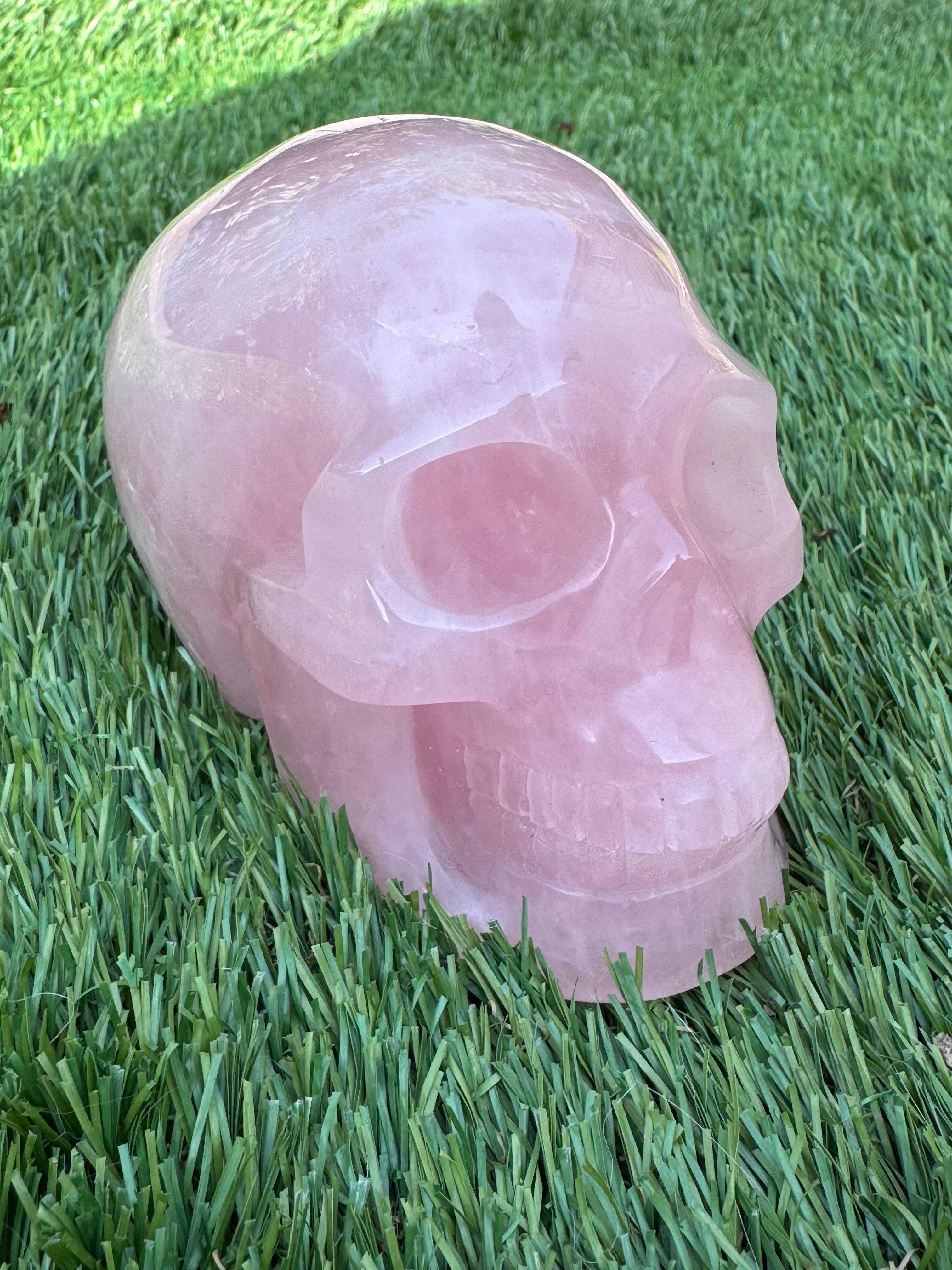 Large Rose Quartz crystal, hand carved skull 993gms.