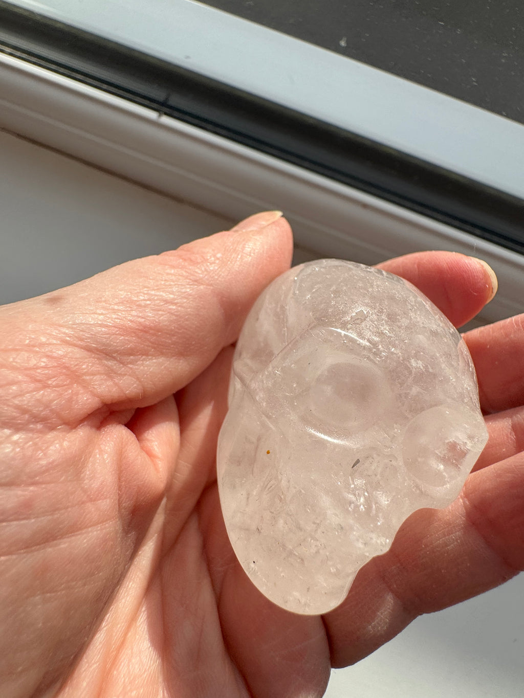 Clear quartz crystal hand carved skull