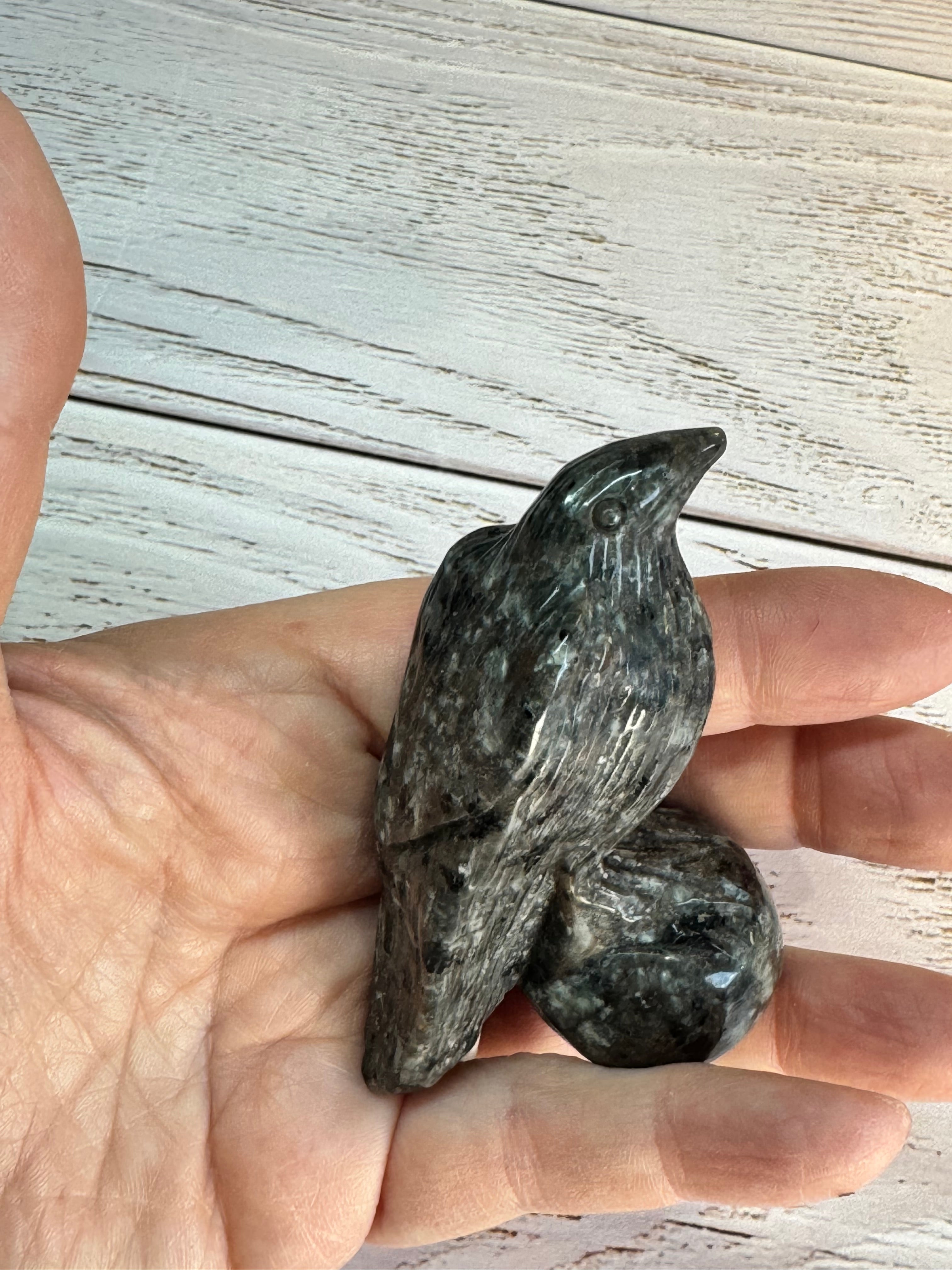 Yooperlite Raven Crystal Carving, UV reactive.