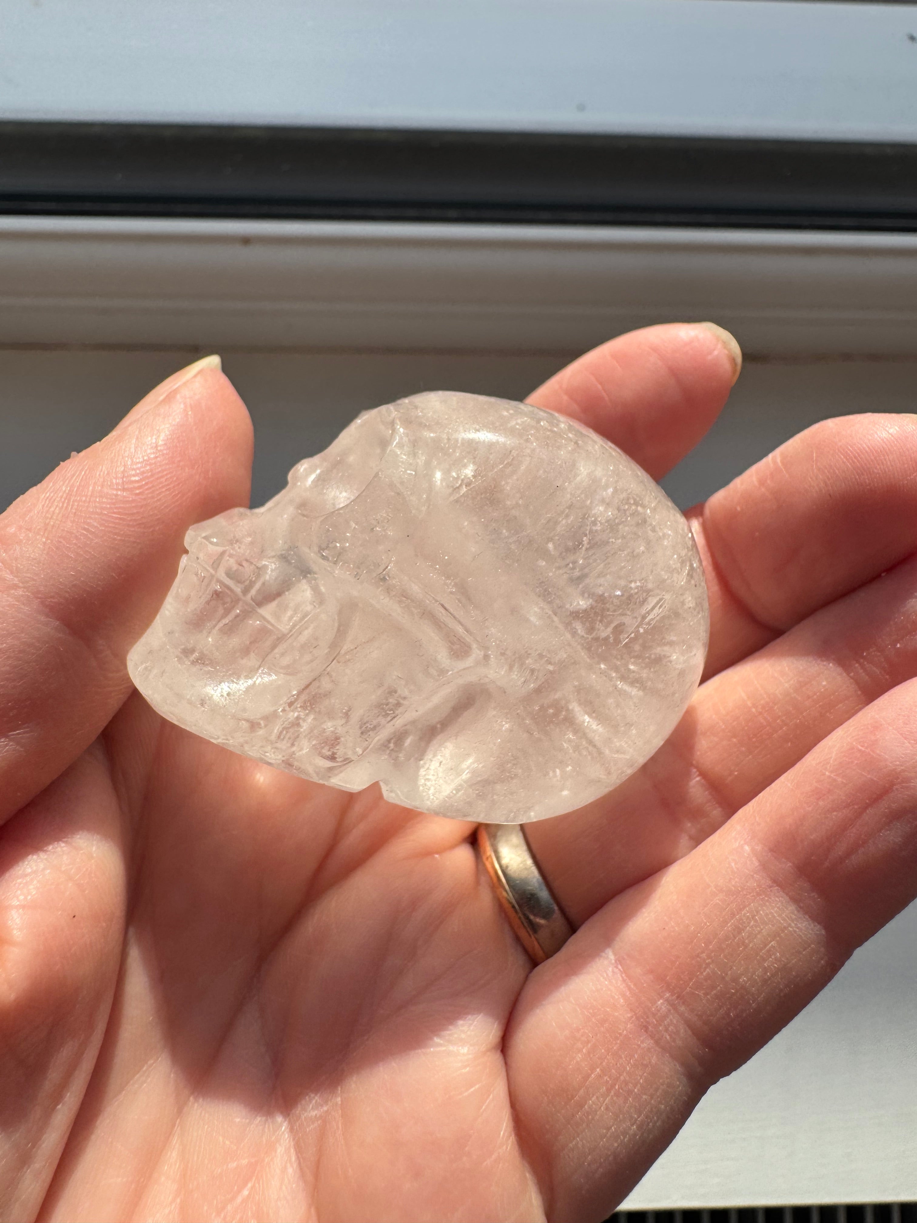 Clear quartz crystal hand carved skull