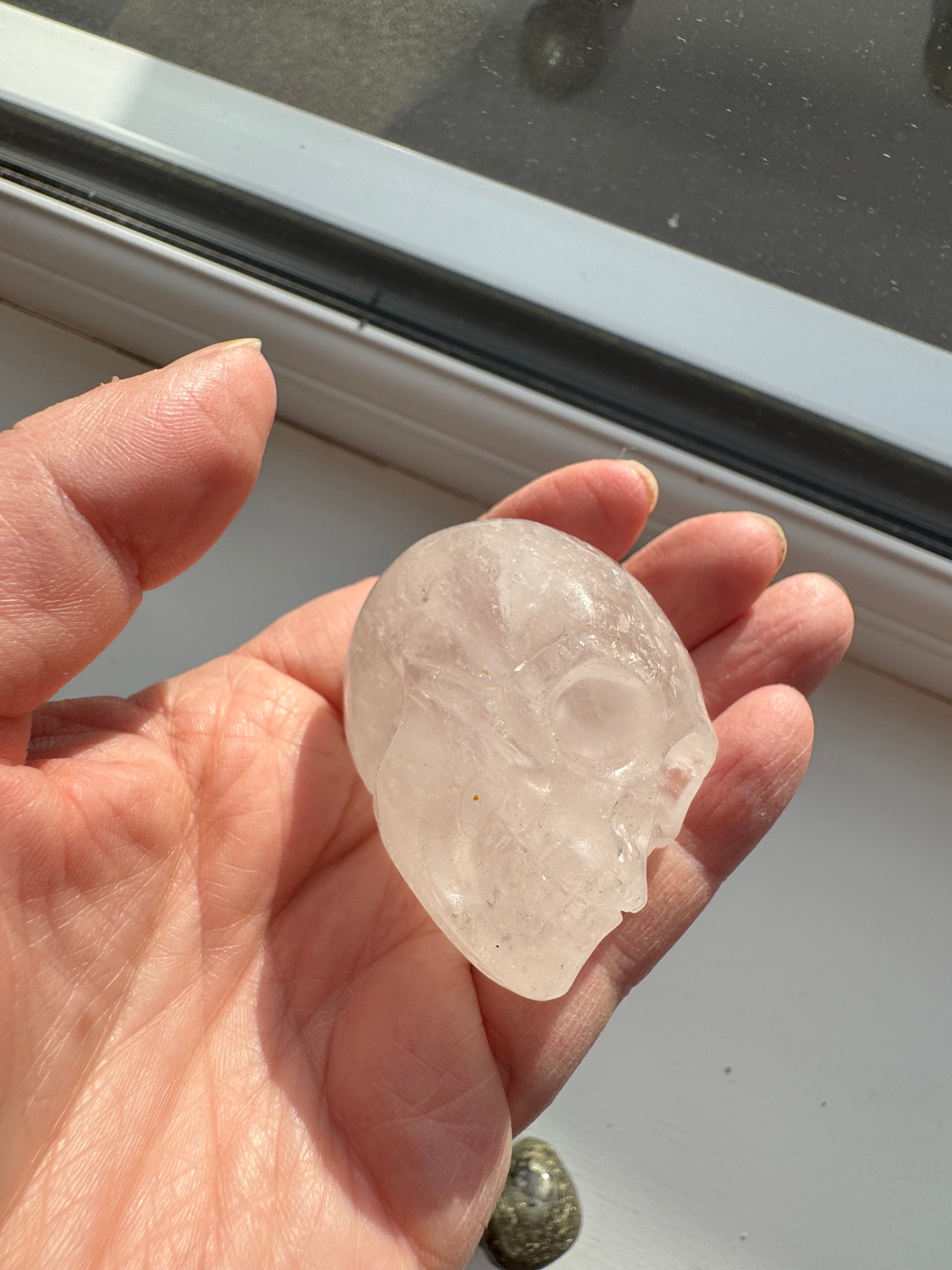 Clear quartz crystal hand carved skull