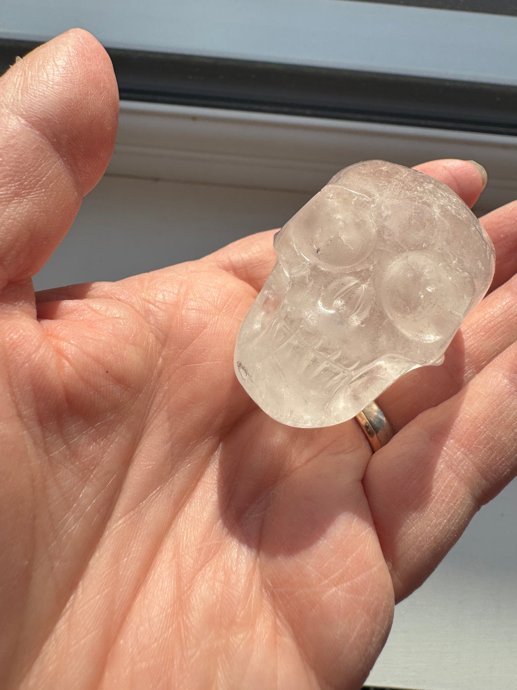 Clear quartz crystal hand carved skull