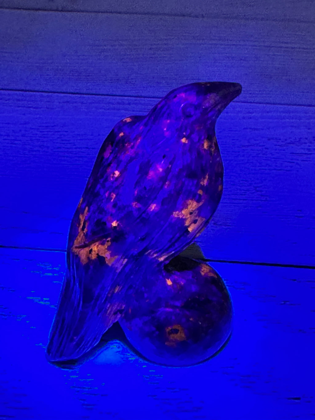 Yooperlite Raven Crystal Carving, UV reactive.