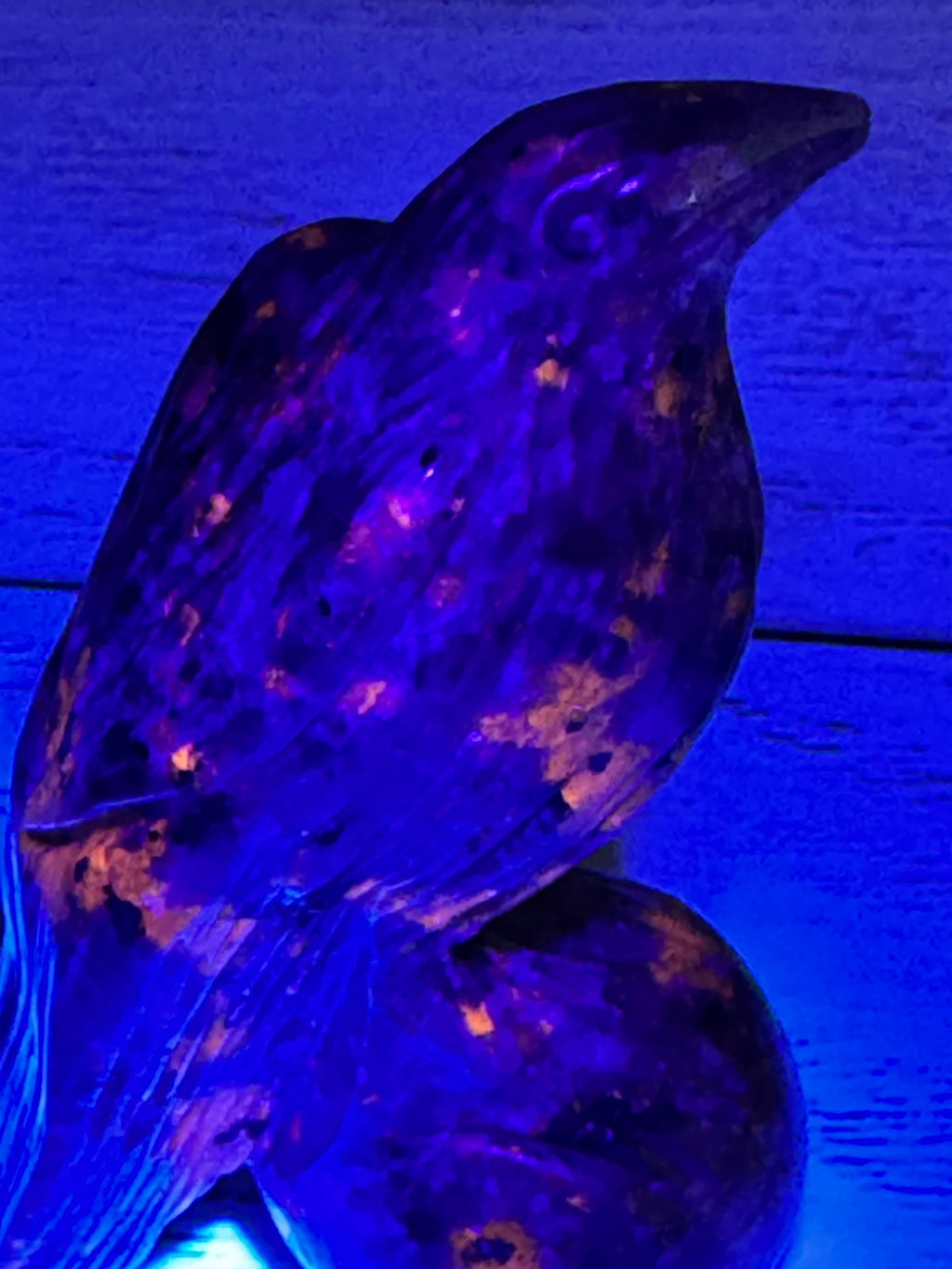 Yooperlite Raven Crystal Carving, UV reactive.