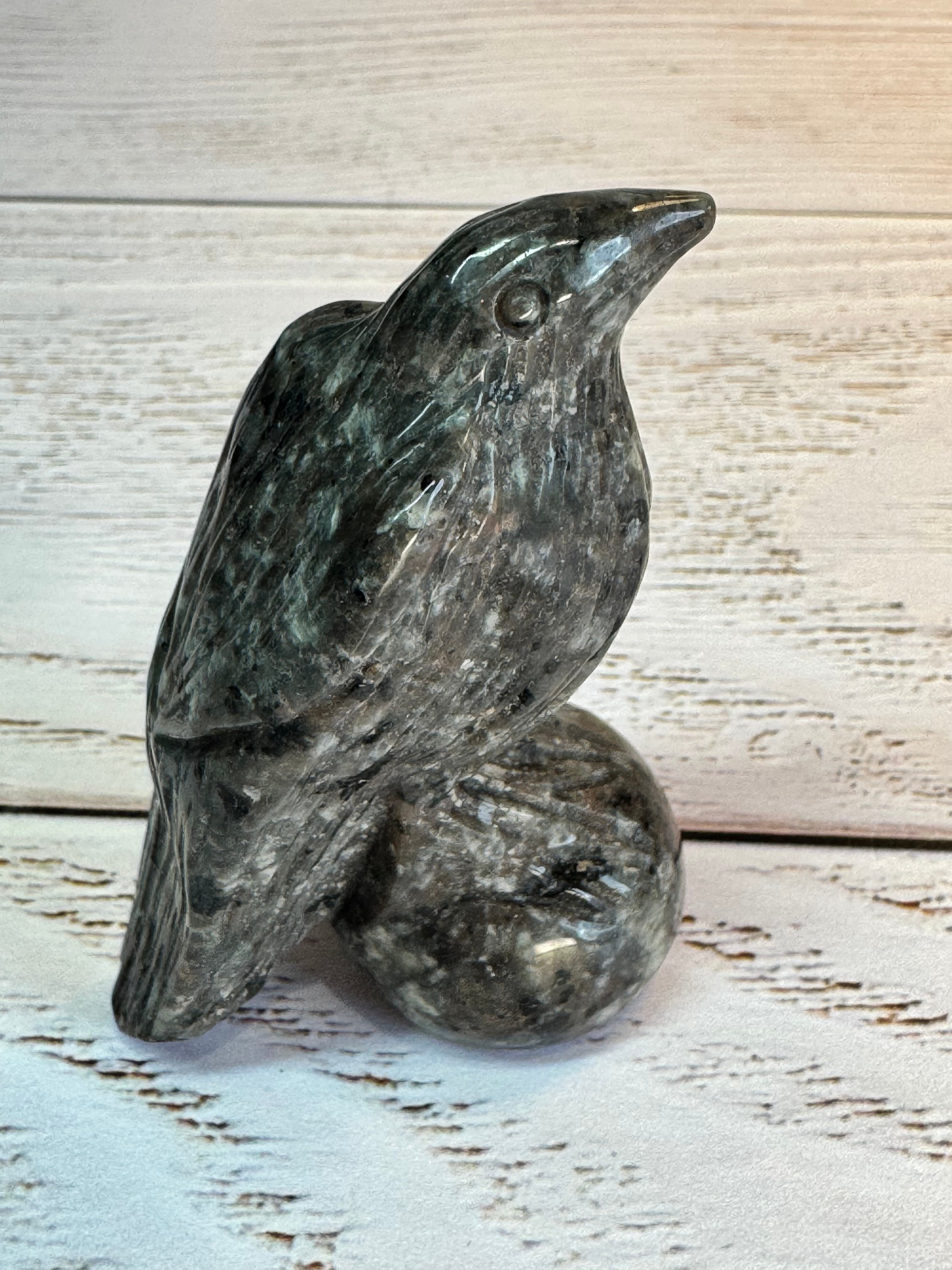 Yooperlite Raven Crystal Carving, UV reactive.