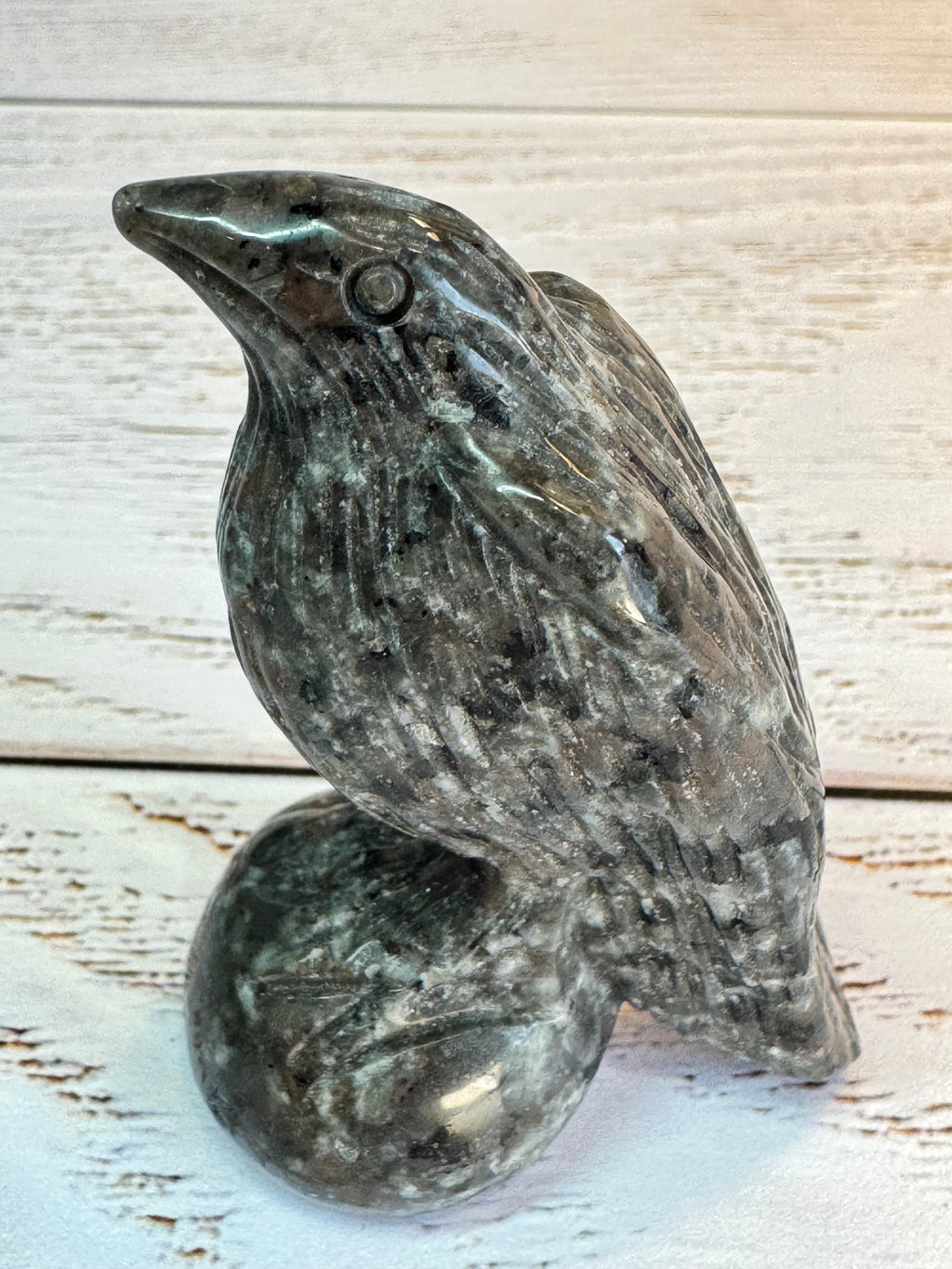 Yooperlite Raven Crystal Carving, UV reactive.