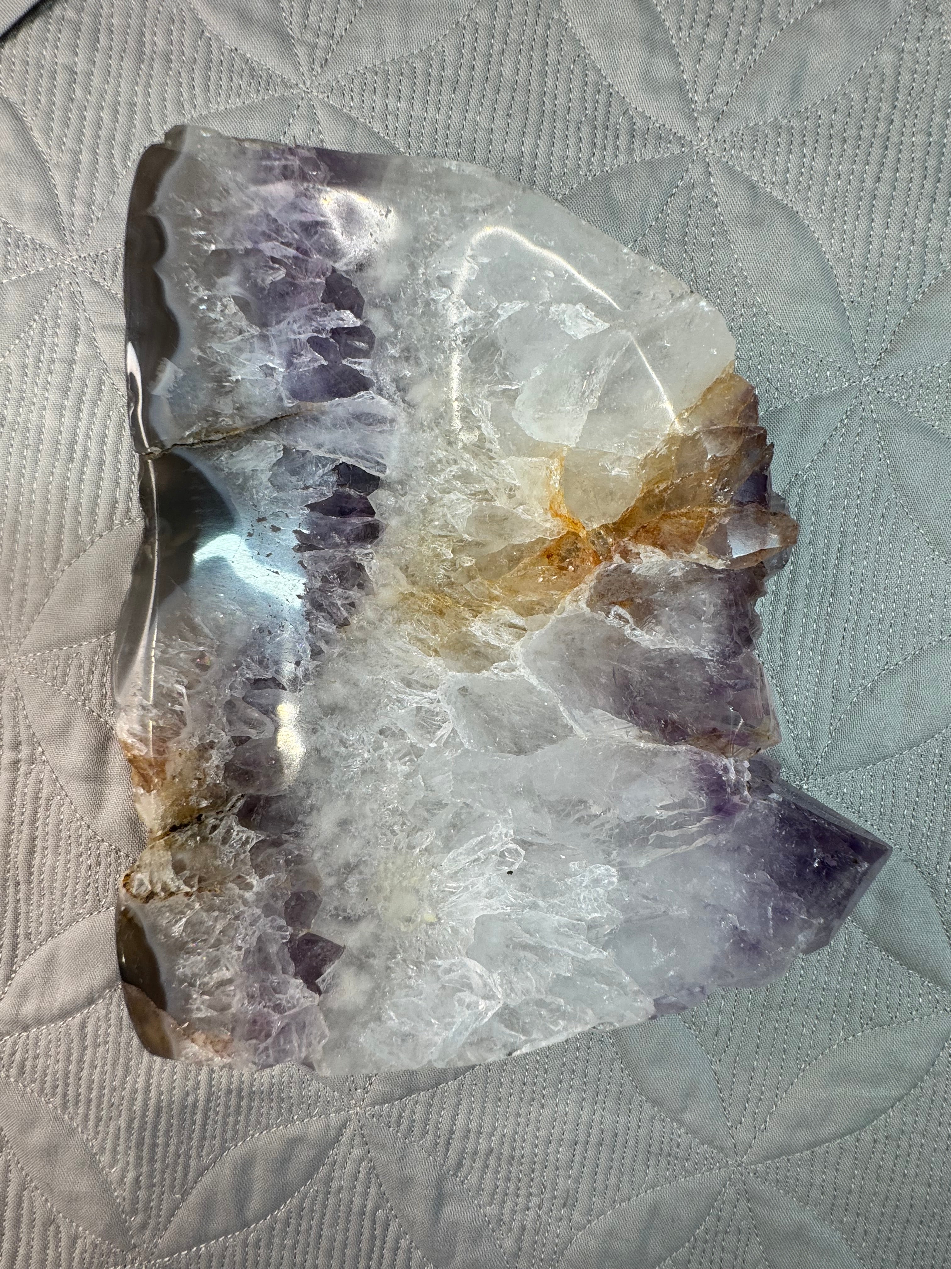 Crystal rock bowl on a textured fabric background