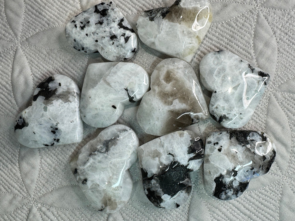 Collection of polished stones on a textured fabric surface