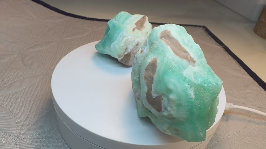 video of 2 green/blue crystals on a turntable