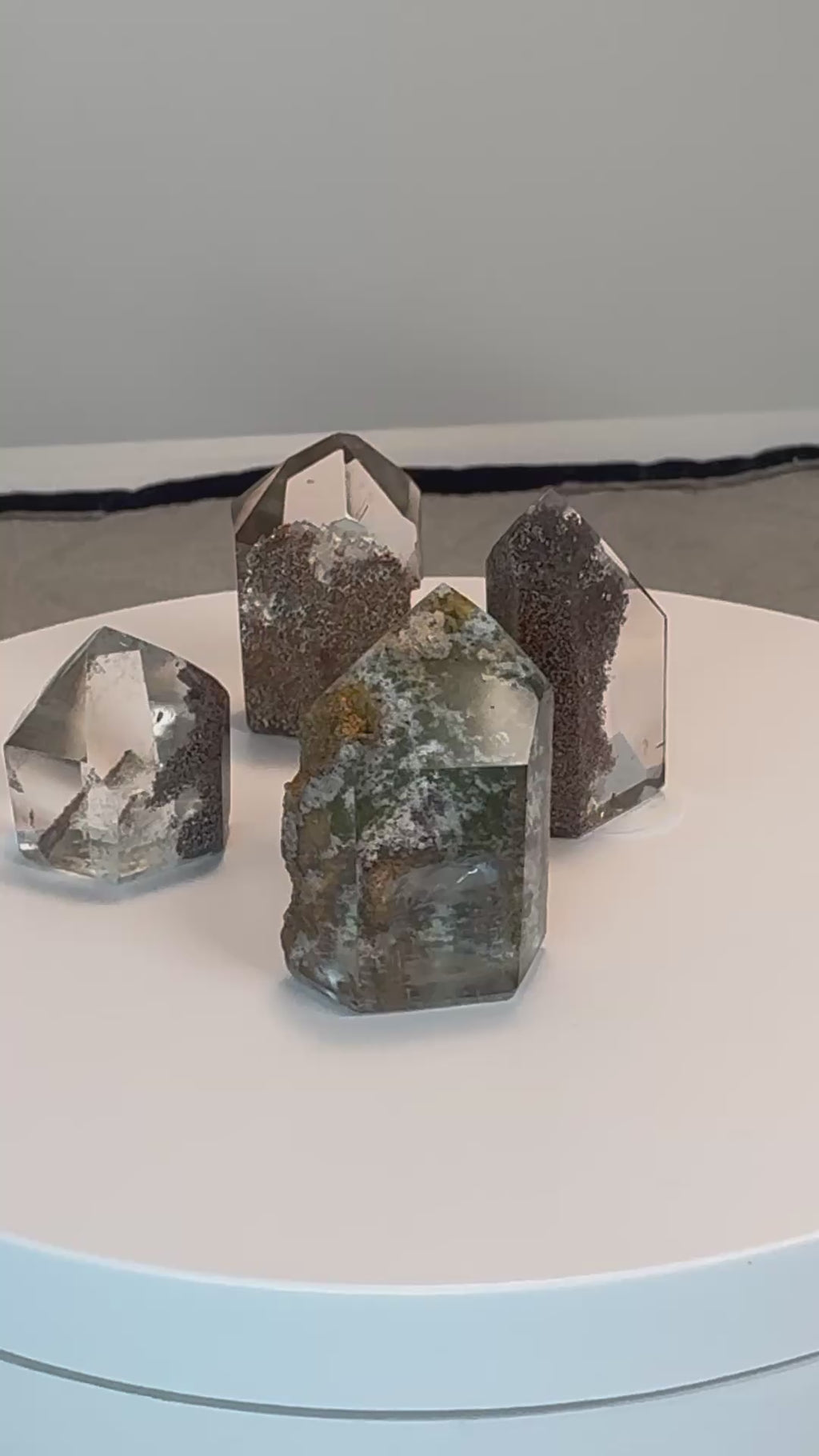 mini quartz towers standing together on a turntable